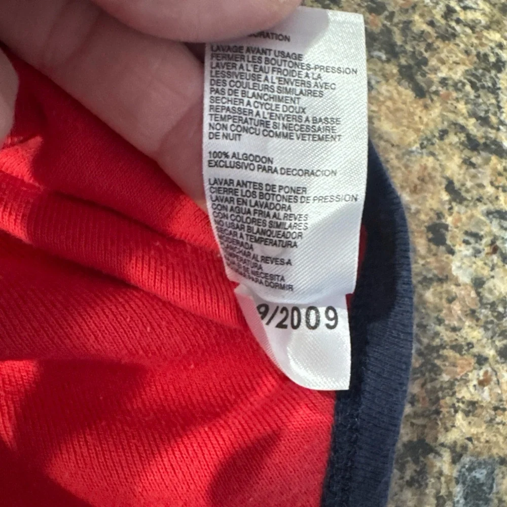 Nike Kids Bodysuit in Red with Blue Trim 0-3M
